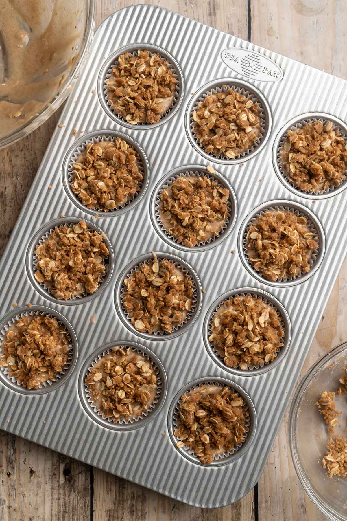 Banana oatmeal muffins baked in a muffin pan.