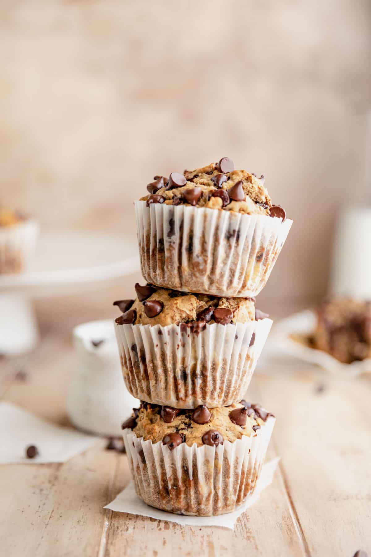 Three banana protein muffins stacked.