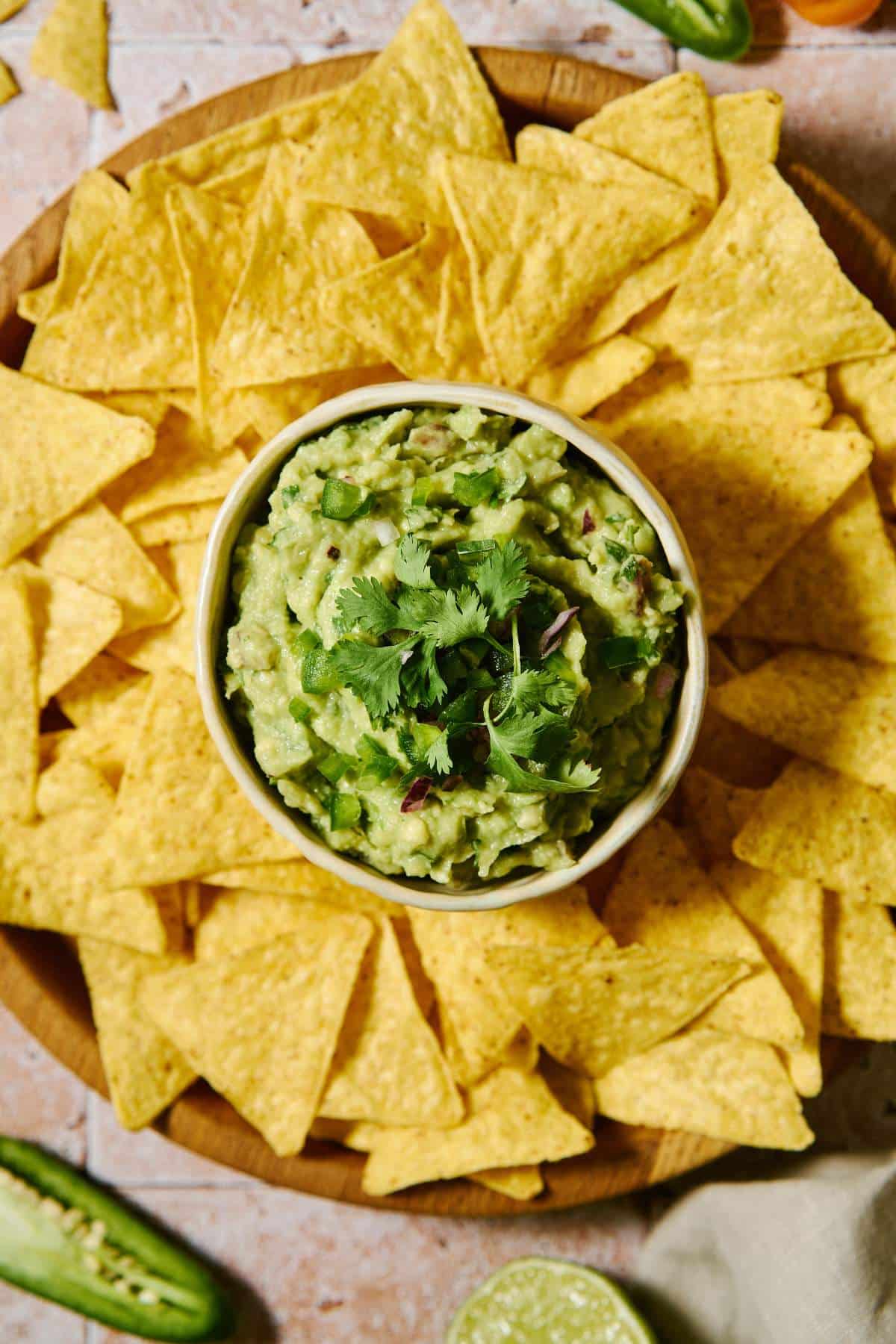 Chipotle's guacamole recipe in a bowl and served with tortilla chips.