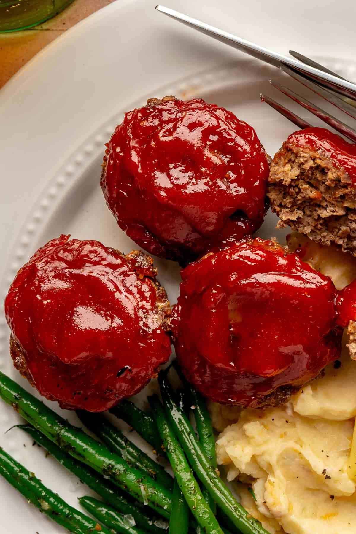 Mini meatloaf recipe topped with a ketchup glaze.