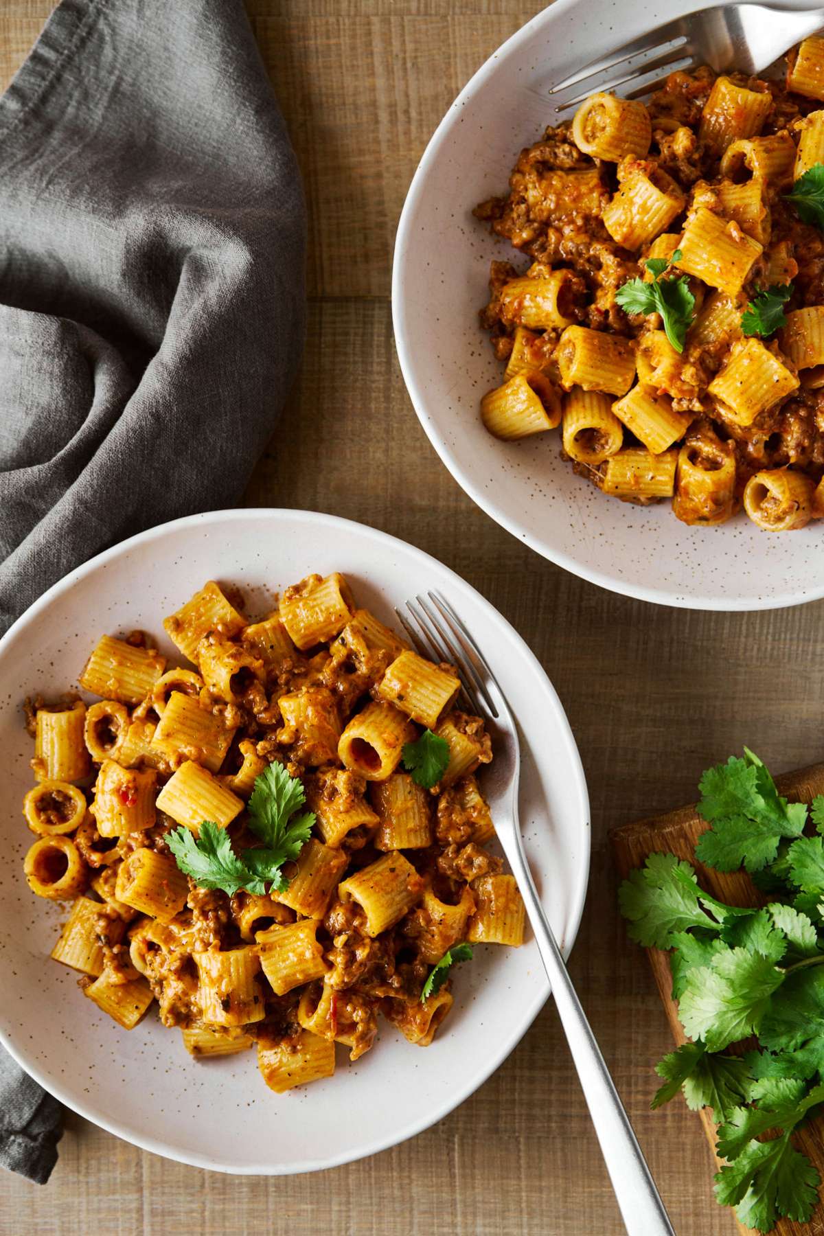 Two white bowls filled with Mexican pasta.