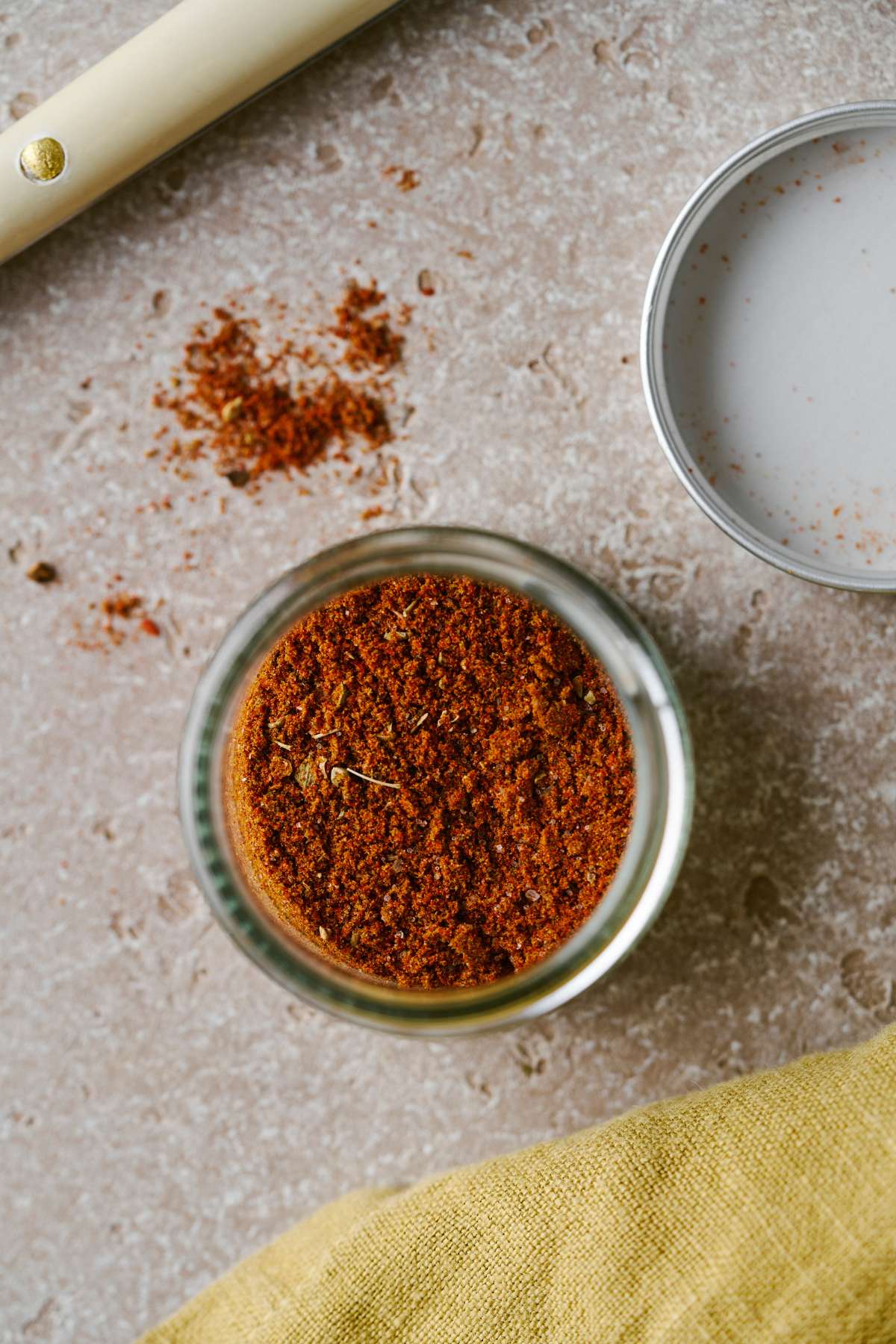 Taco seasoning mixed in a glass jar.