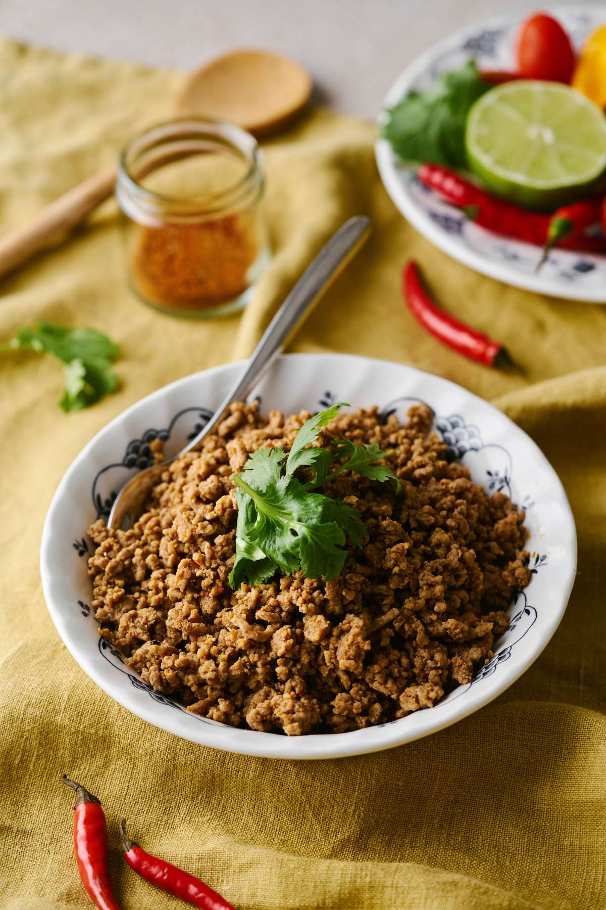 Ground beef in a bowl garnished with cilantro.