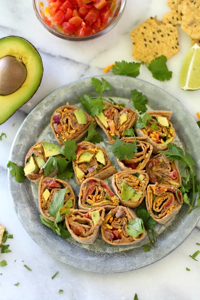 Healthy Southwestern Pinwheels are the perfect appetizer for summertime parties and they even make for a fun lunch or snack idea. These crowd pleasers are super yummy, easy to make and can even be prepared ahead of time.