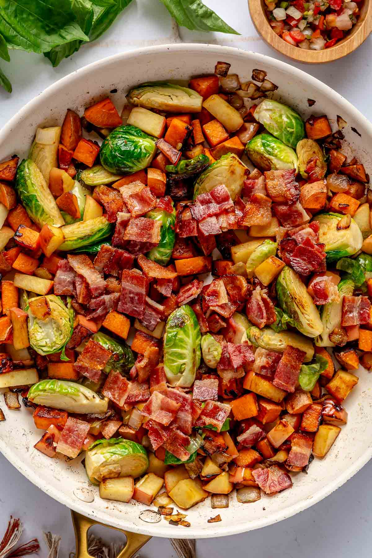 Sweet potato hash with Brussels sprouts, bacon and apples.