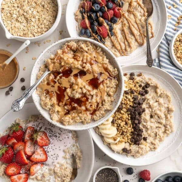 Oatmeal bowls topped with various toppings.