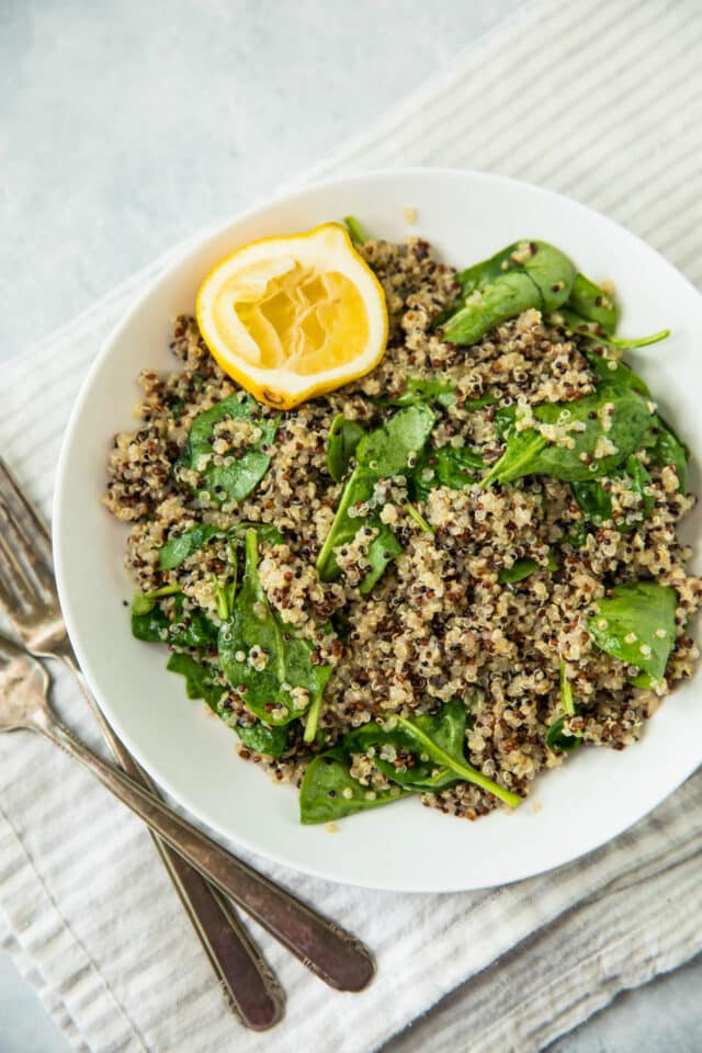 quinoa and spinach side dish to serve with Healthy Pistachio Crusted White Fish