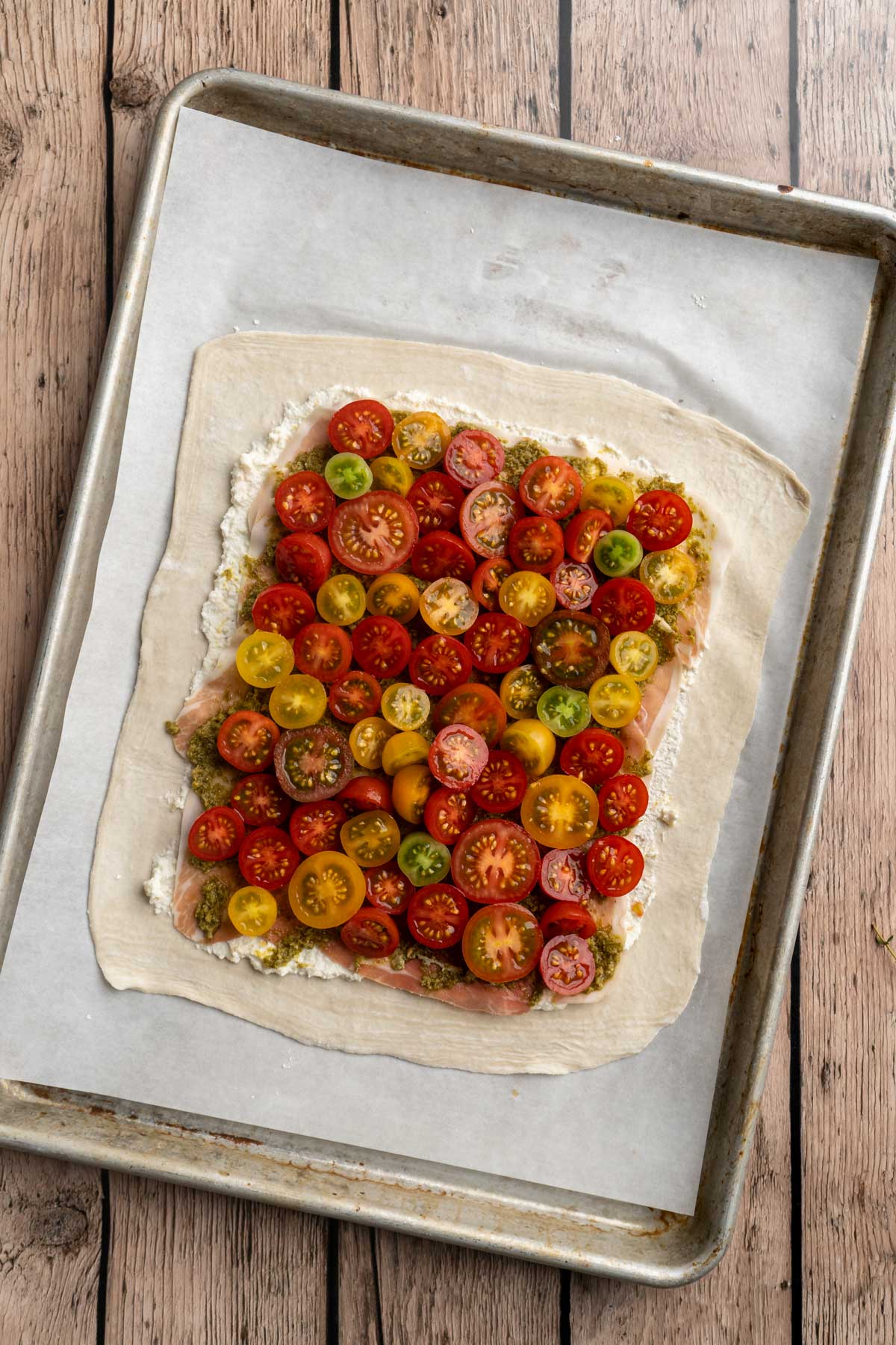 Tomatoes on top of a puff pastry.