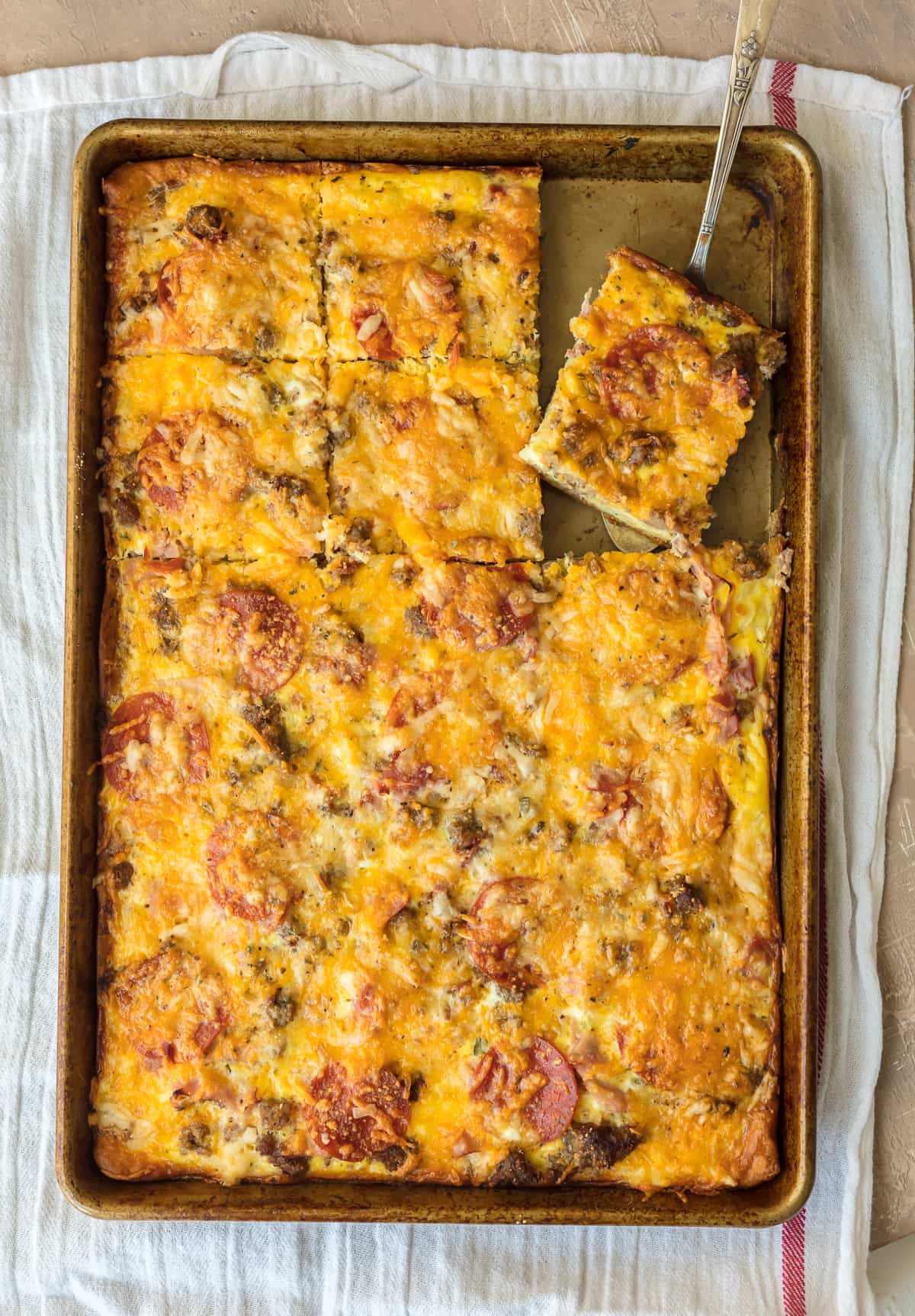 breakfast pizza served on a cookie sheet pan