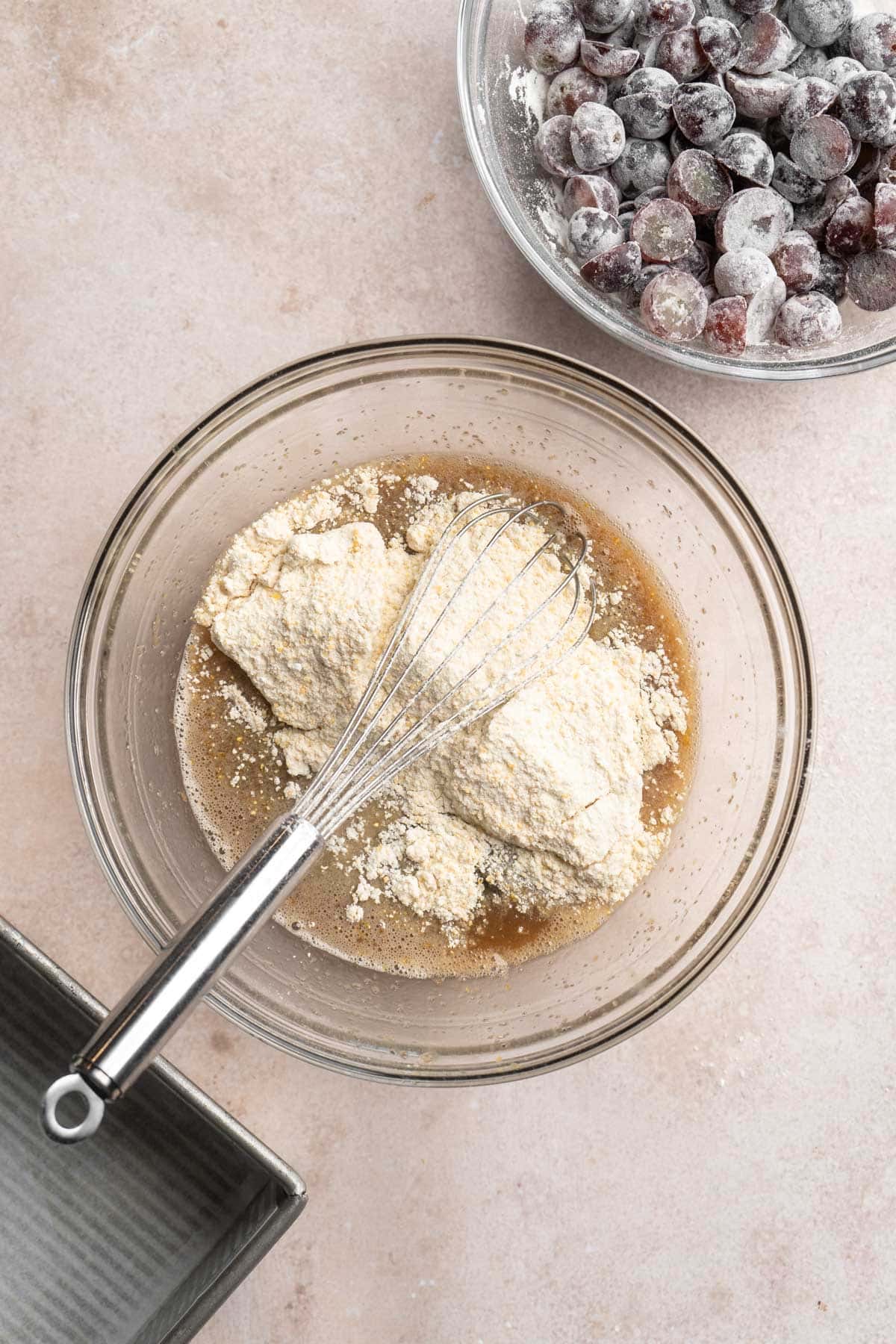 Add dry ingredients to wet ingredients in a bowl.