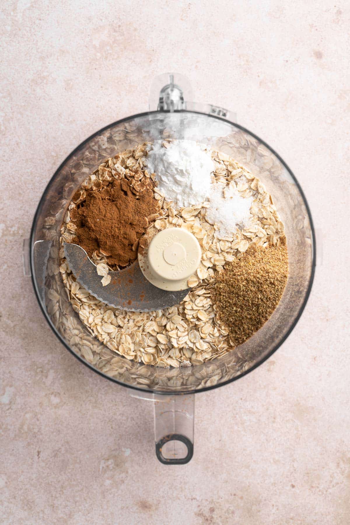 Rolled oats and spices in a food processor.