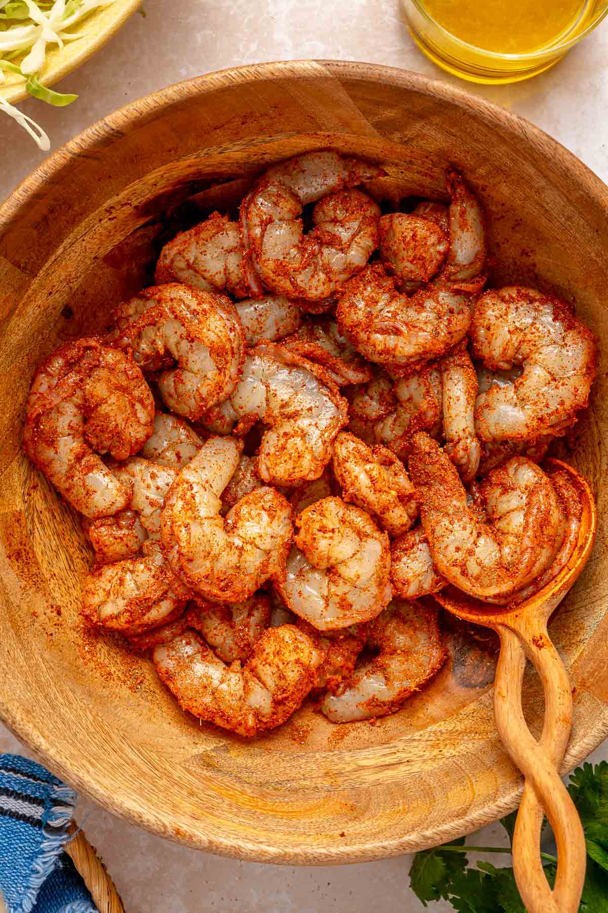 Marinating shrimp in spices.