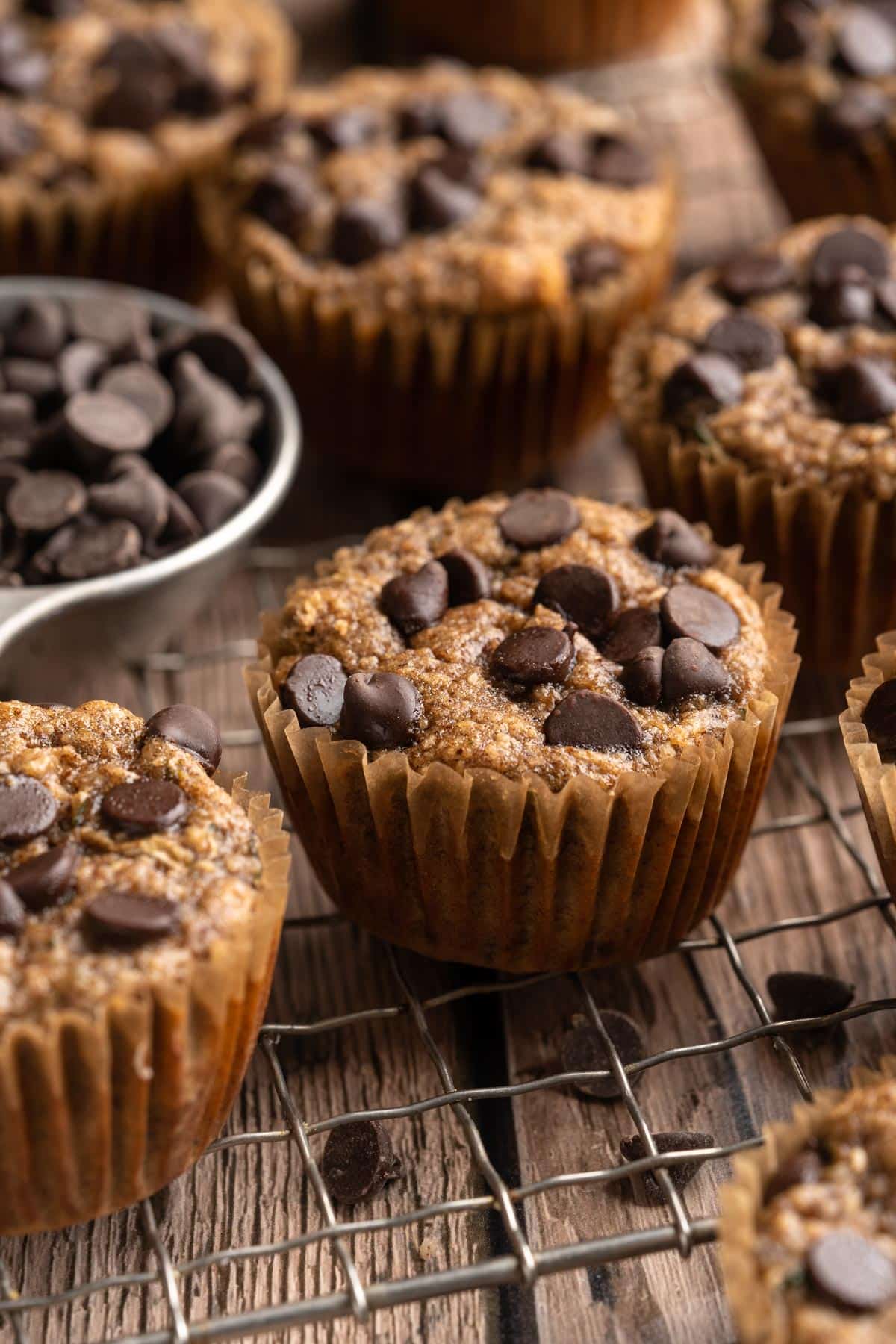 Banana zucchini muffins topped with chocolate chips.