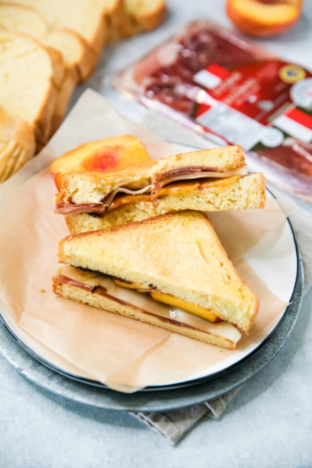 grilled cheese with peaches on a plate