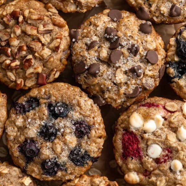 Oatmeal muffins with different mix-ins like blueberries, pecans and chocolate chips.