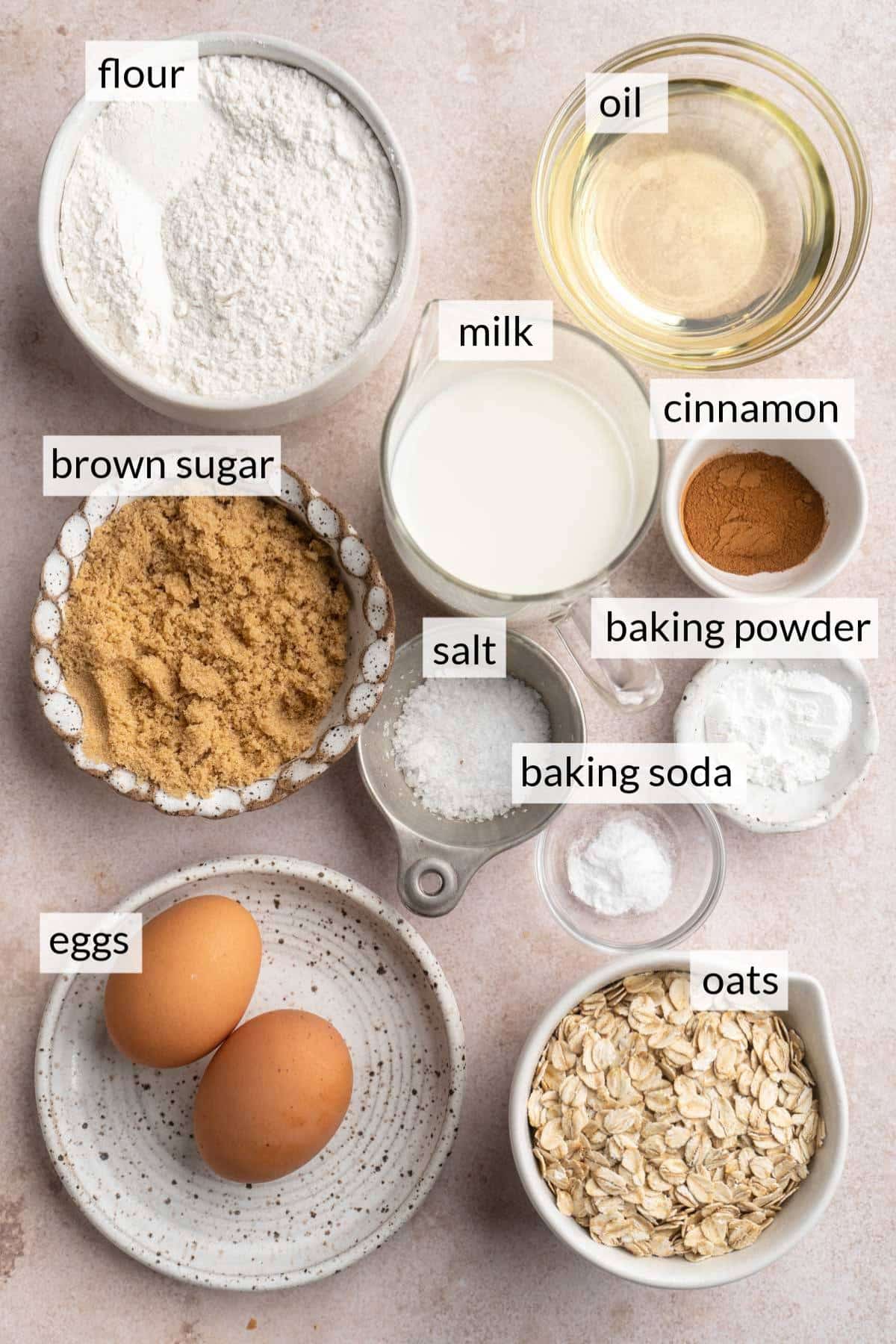 Small bowls with flour, brown sugar, oats and oil.