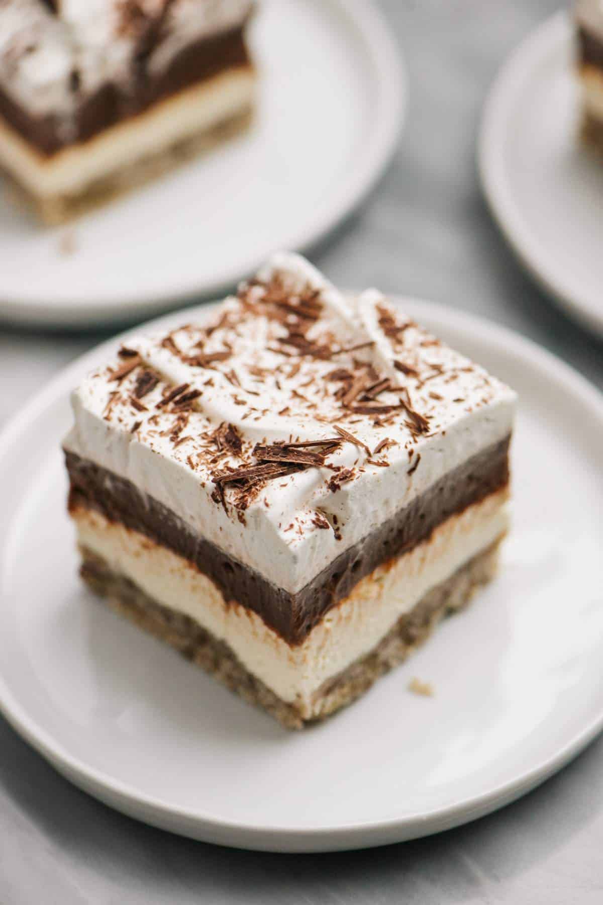 Serving of chocolate delight dessert on a white plate.