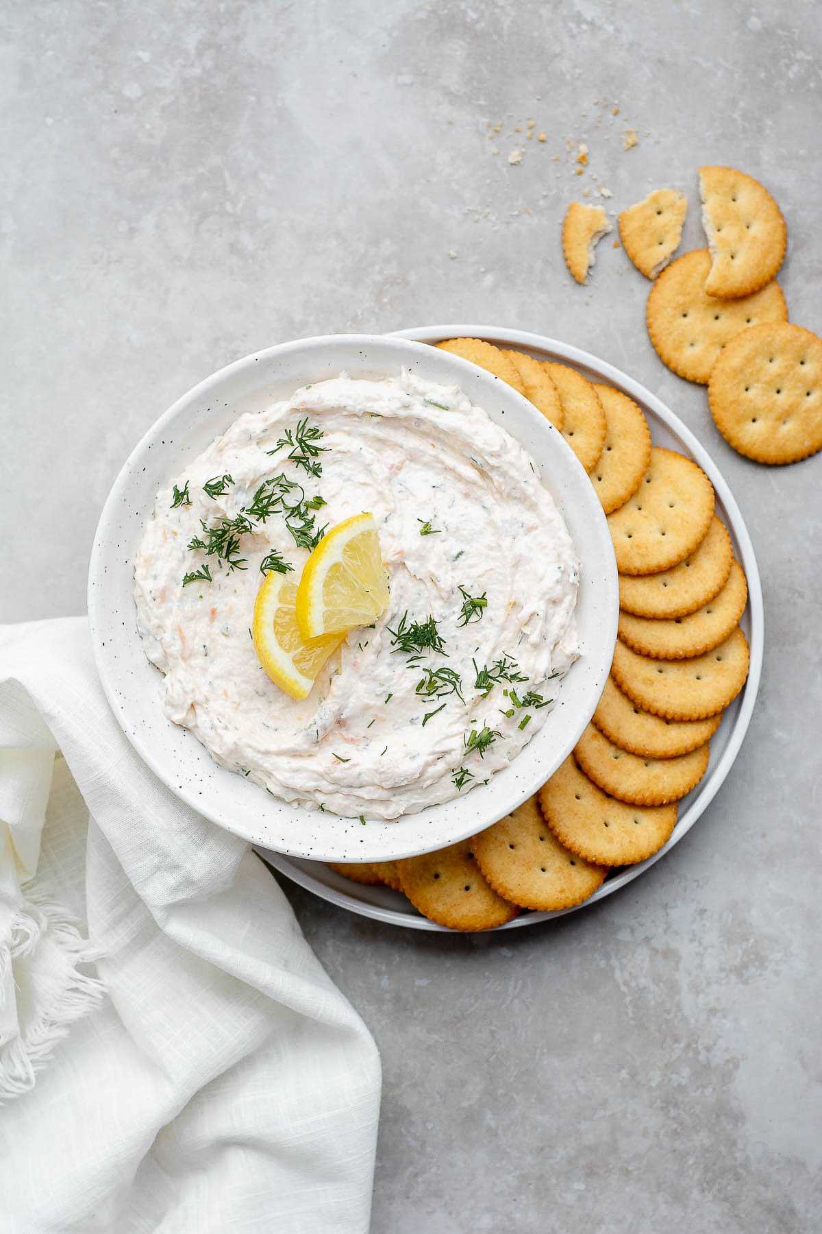 Creamy smoked salmon dip served with Ritz crackers.