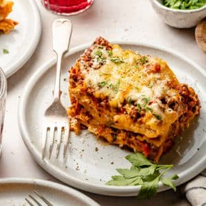 Serving of crockpot lasagna on a plate.