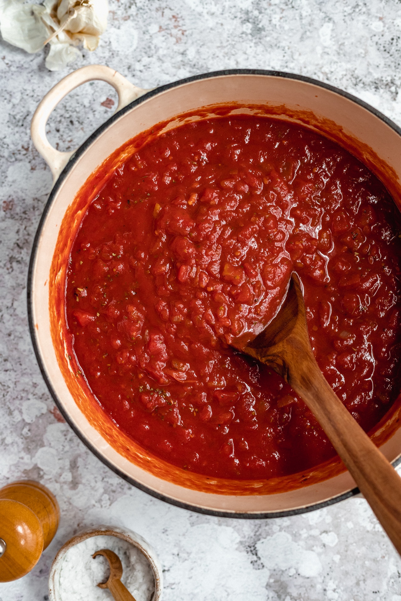 Pasta sauce cooking in a large stock pot.