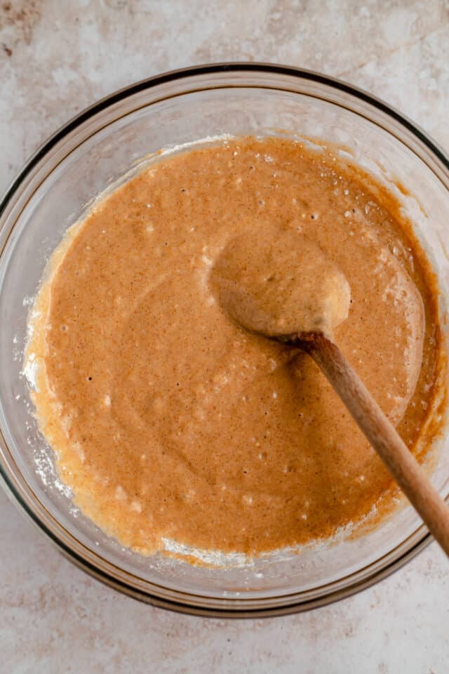 mixing batter for pumpkin waffles