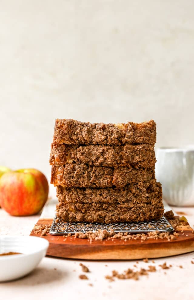 slices of apple streusel bread stacked on top of each other 