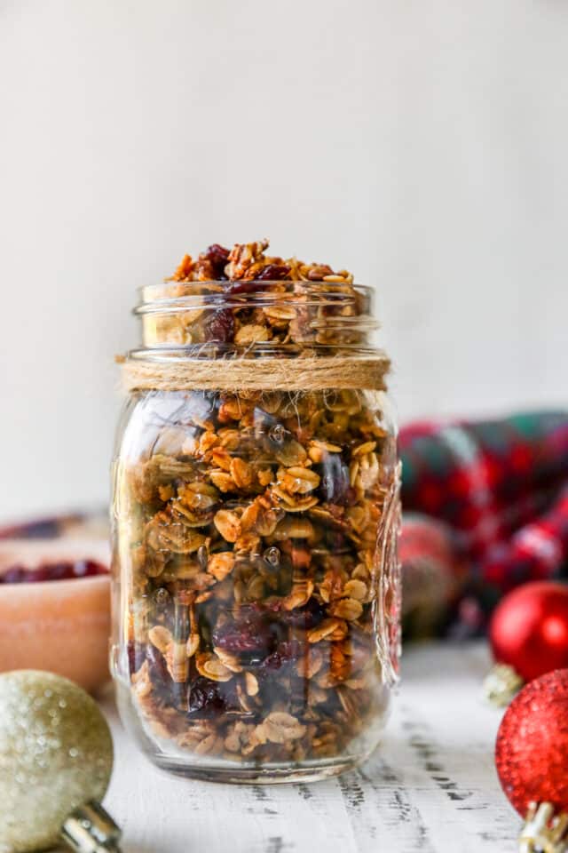 granola in a glass jar wrapped with twine