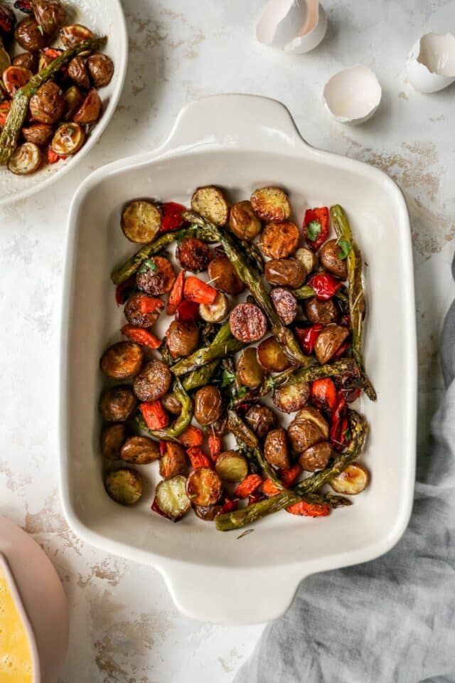 Roasted vegetables in a baking dish.