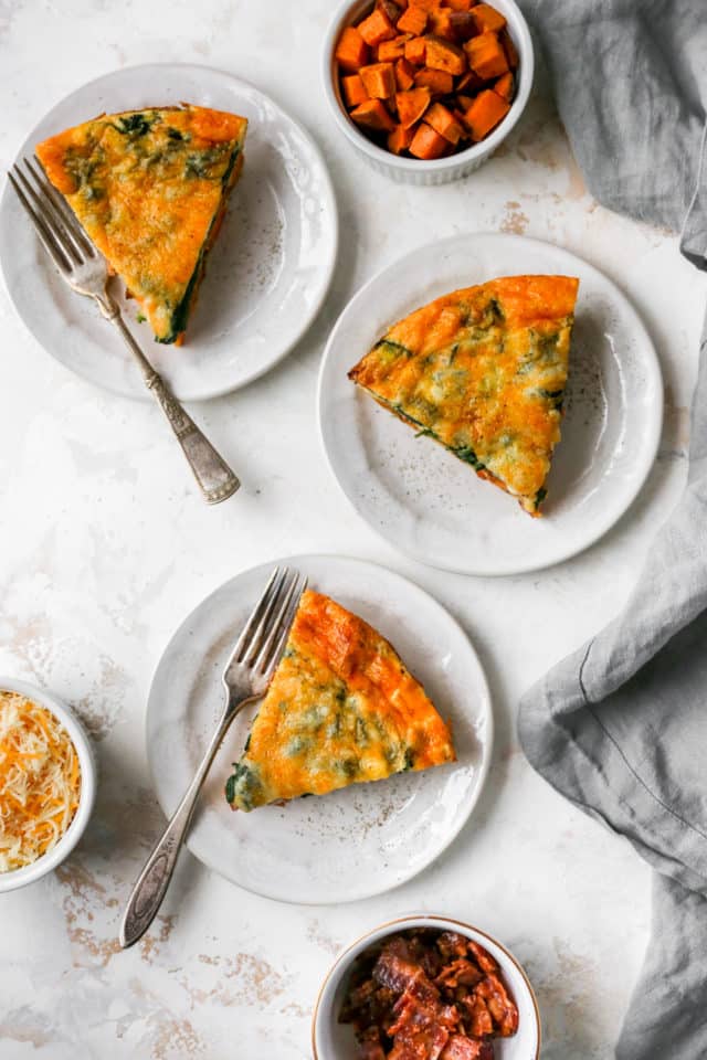 servings of crustless quiche served on small white plates