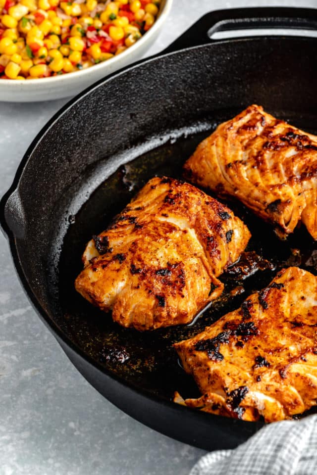 pan fried cod in a cast iron skillet