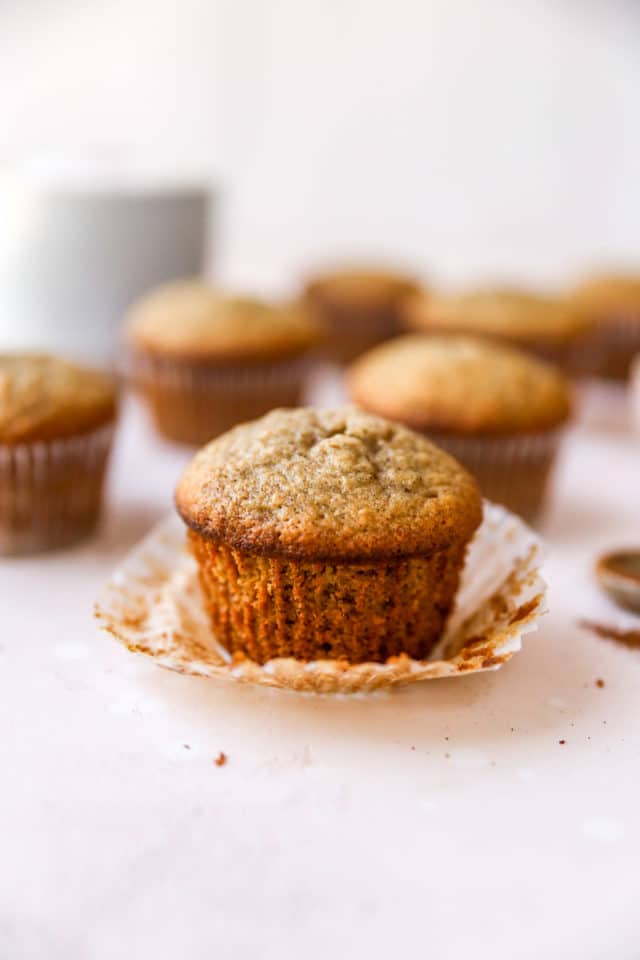 unwrapped banana muffin near other muffins