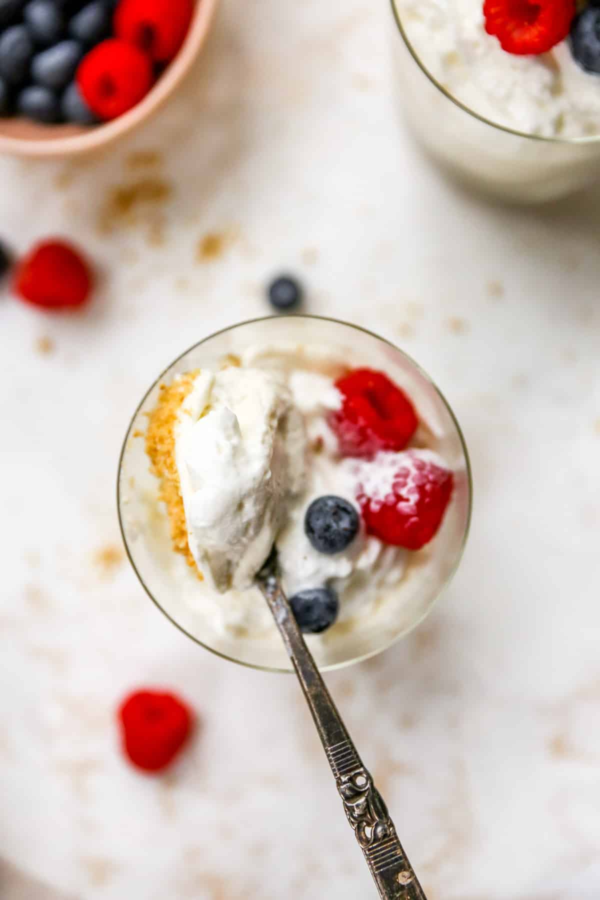 spoonful of cheesecake and fresh berries