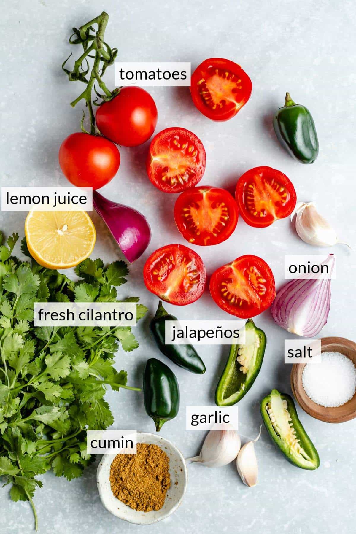 Fresh cilantro, tomatoes, peppers, onion and garlic.