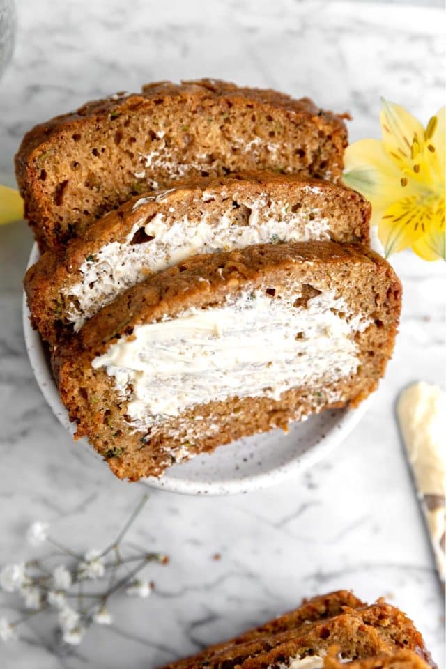 slices of bread with butter spread over the top