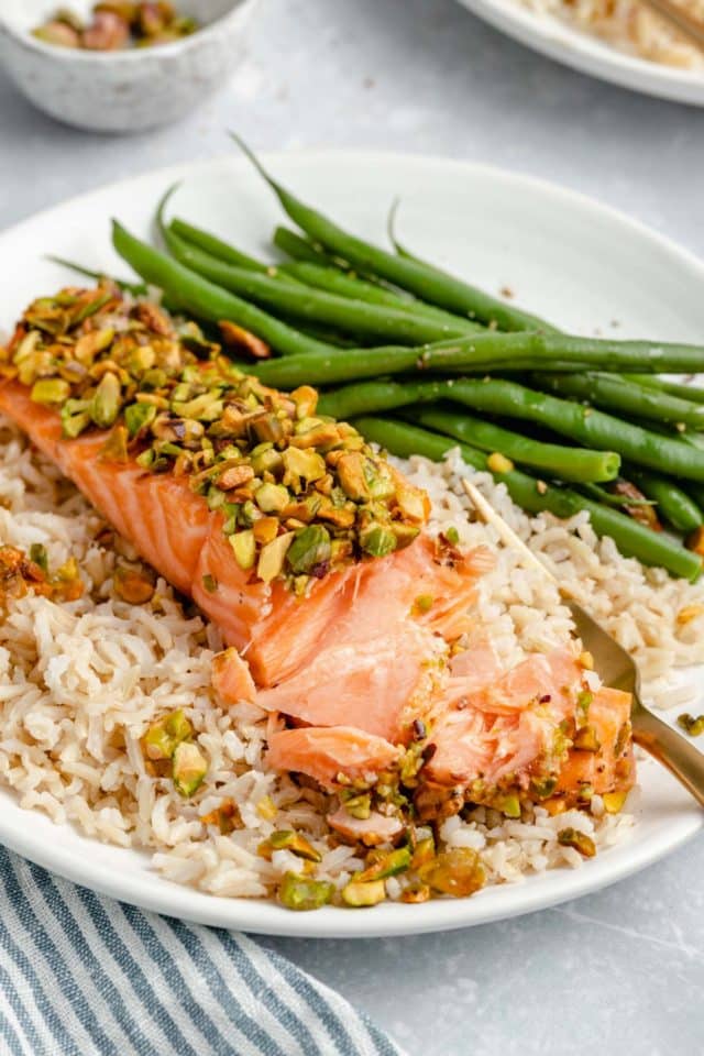 flaked salmon topped with chopped pistachios