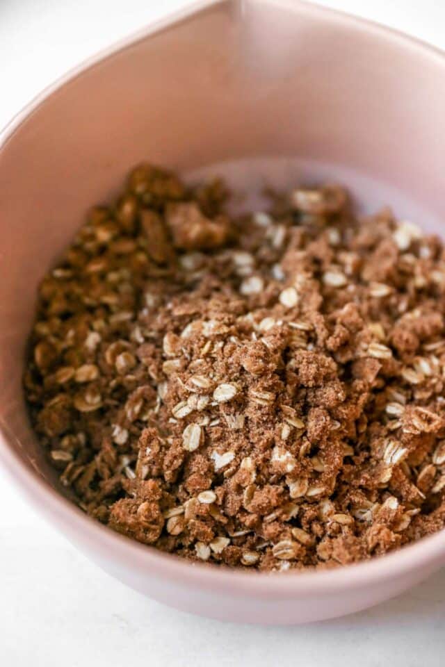 Streusel mixture with sugar and oats in a large bowl.