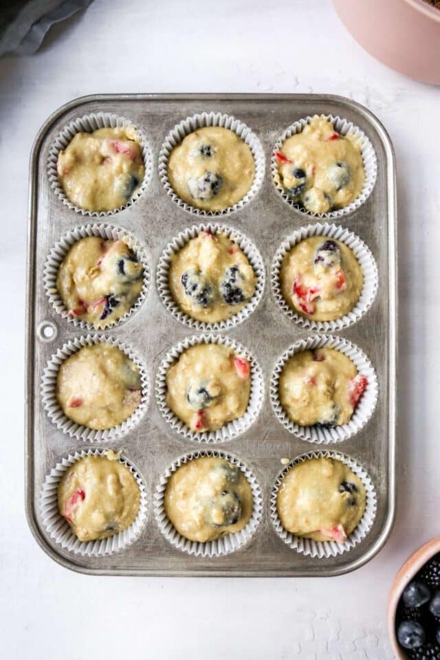 Batter in a muffin pan.