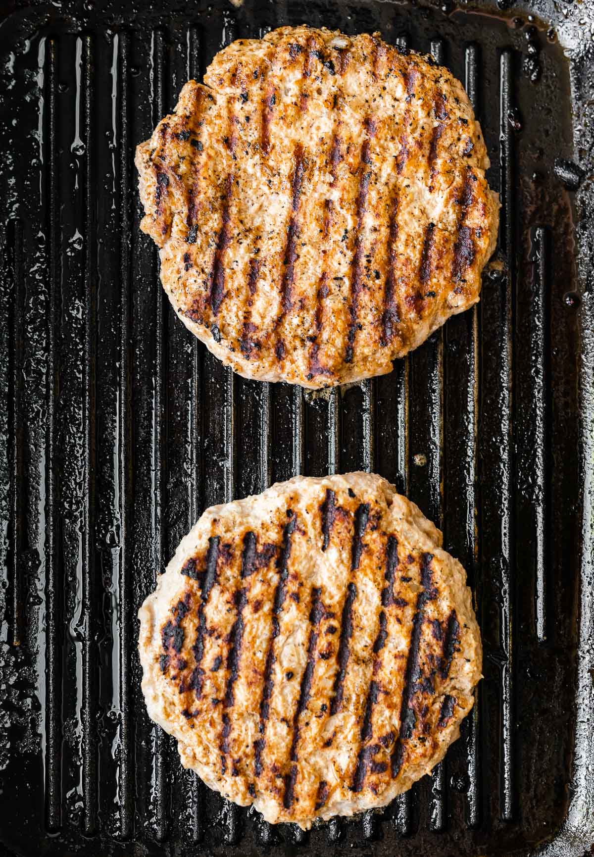 Grilling burger patties on the grill.