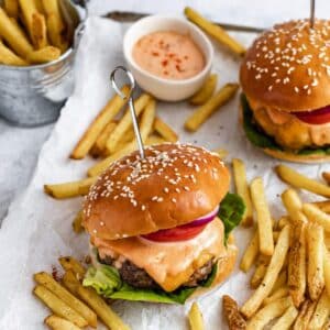 Bacon cheese stuffed burgers made with lettuce, tomato and burger sauce.