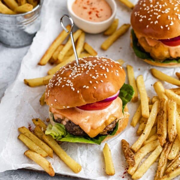 Bacon cheese stuffed burgers made with lettuce, tomato and burger sauce.