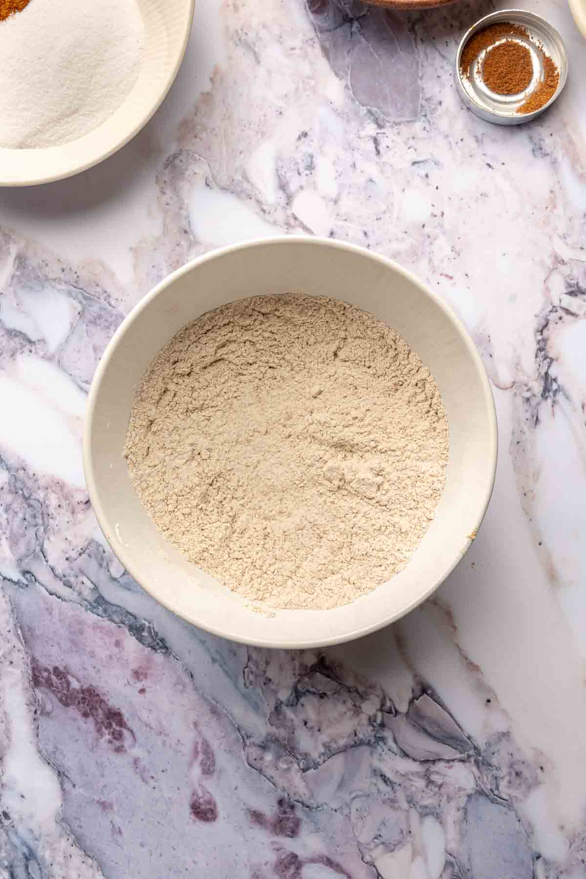 Flour mixed spices in a bowl.