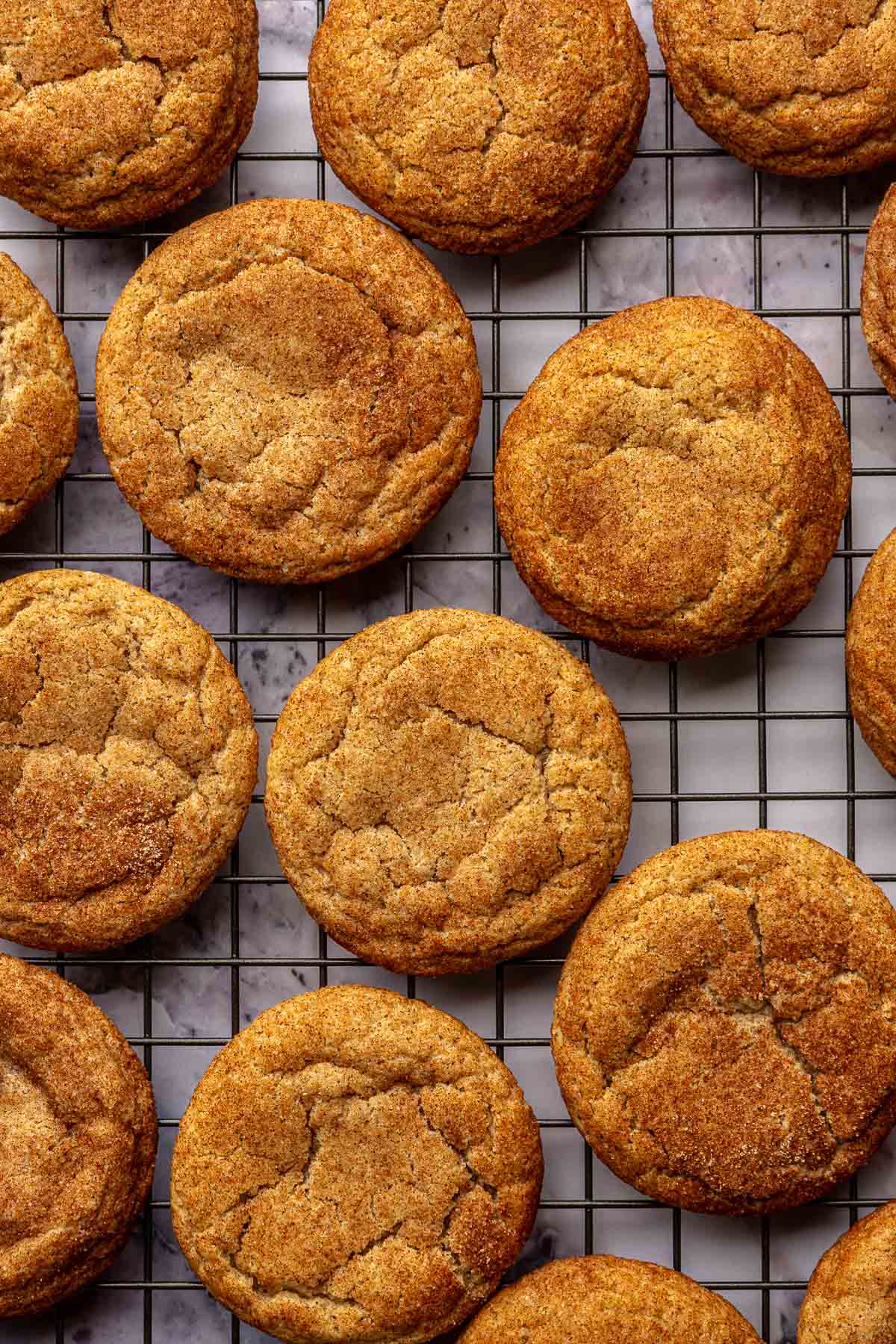 Cookies cooling on a wire rack.