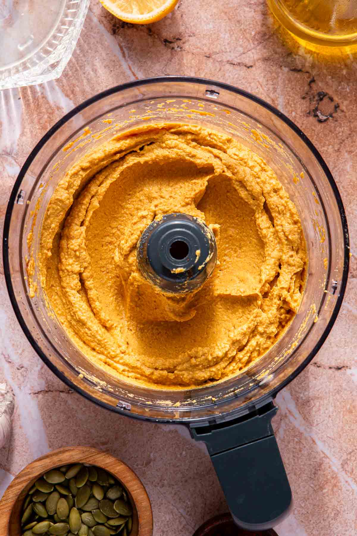 Pumpkin hummus in a food processor.