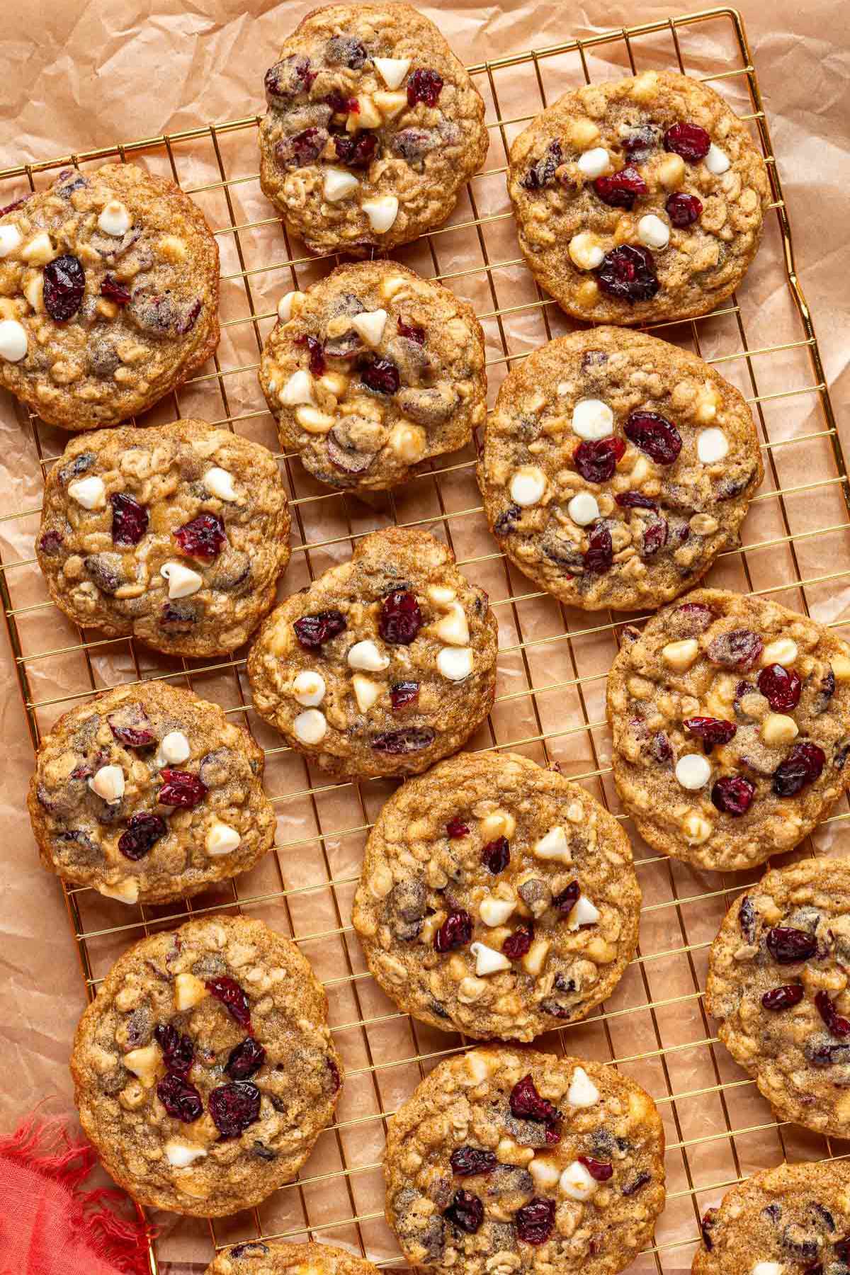 Cranberry oatmeal cookies on a wire cooling rack.