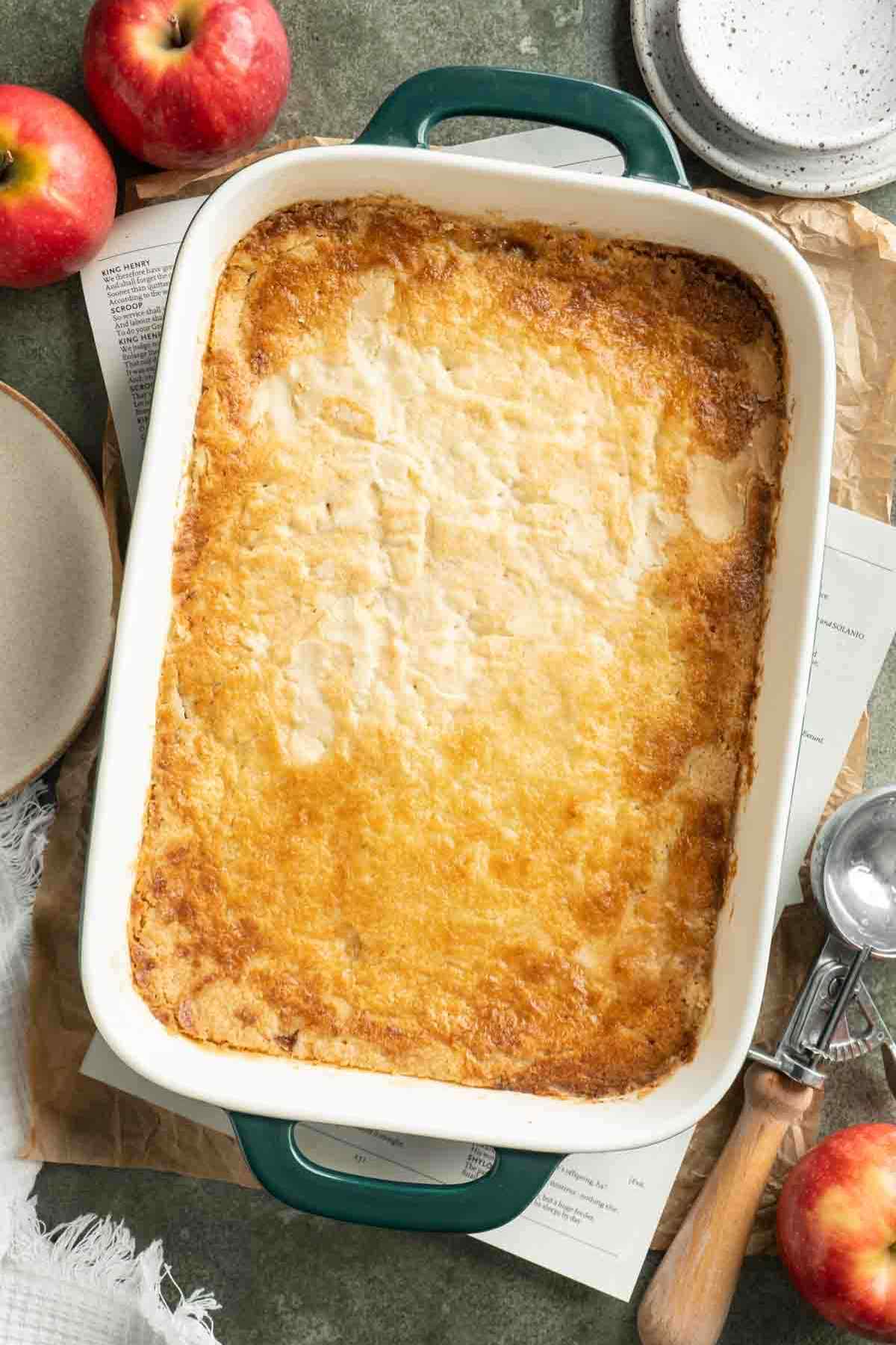 Baked apple dump cake in a baking dish.