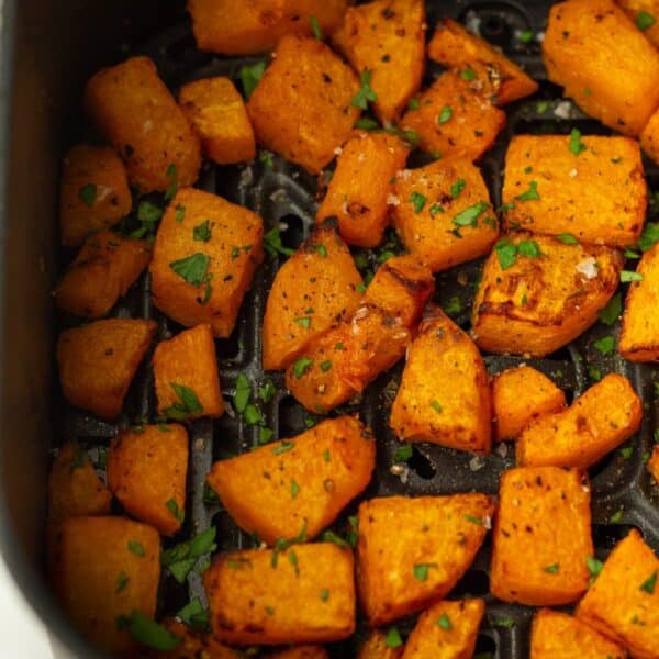 Air fryer butternut squash in an air fryer.