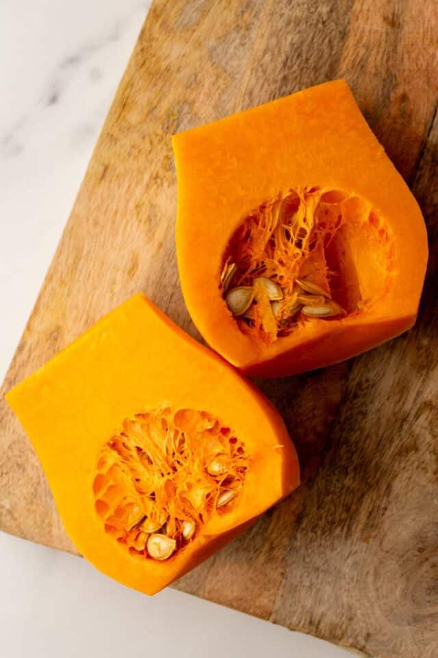 Butternut squash peeled and cut in half.