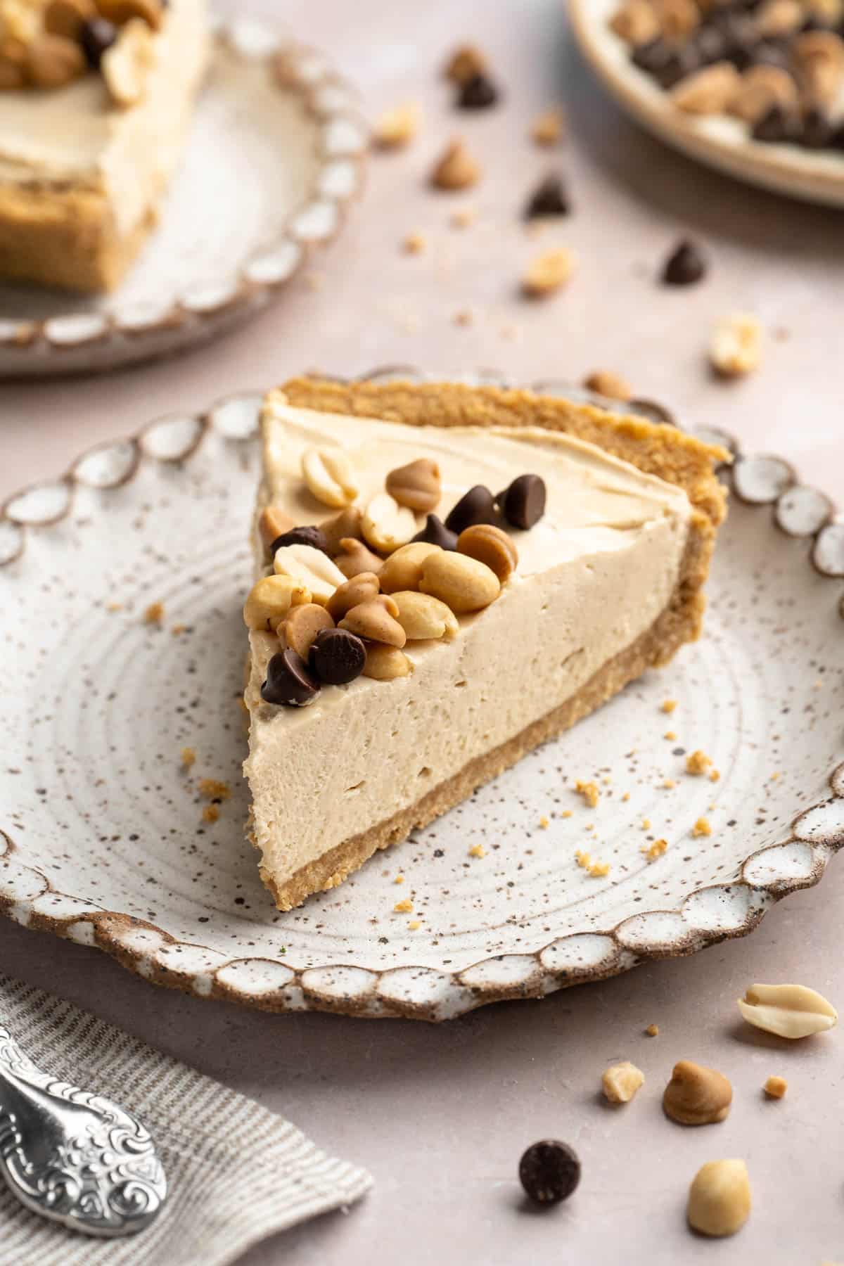 Slice of peanut butter pie on a plate.